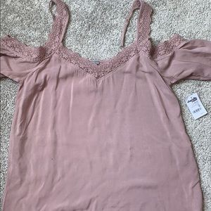 off the shoulder light pink shirt